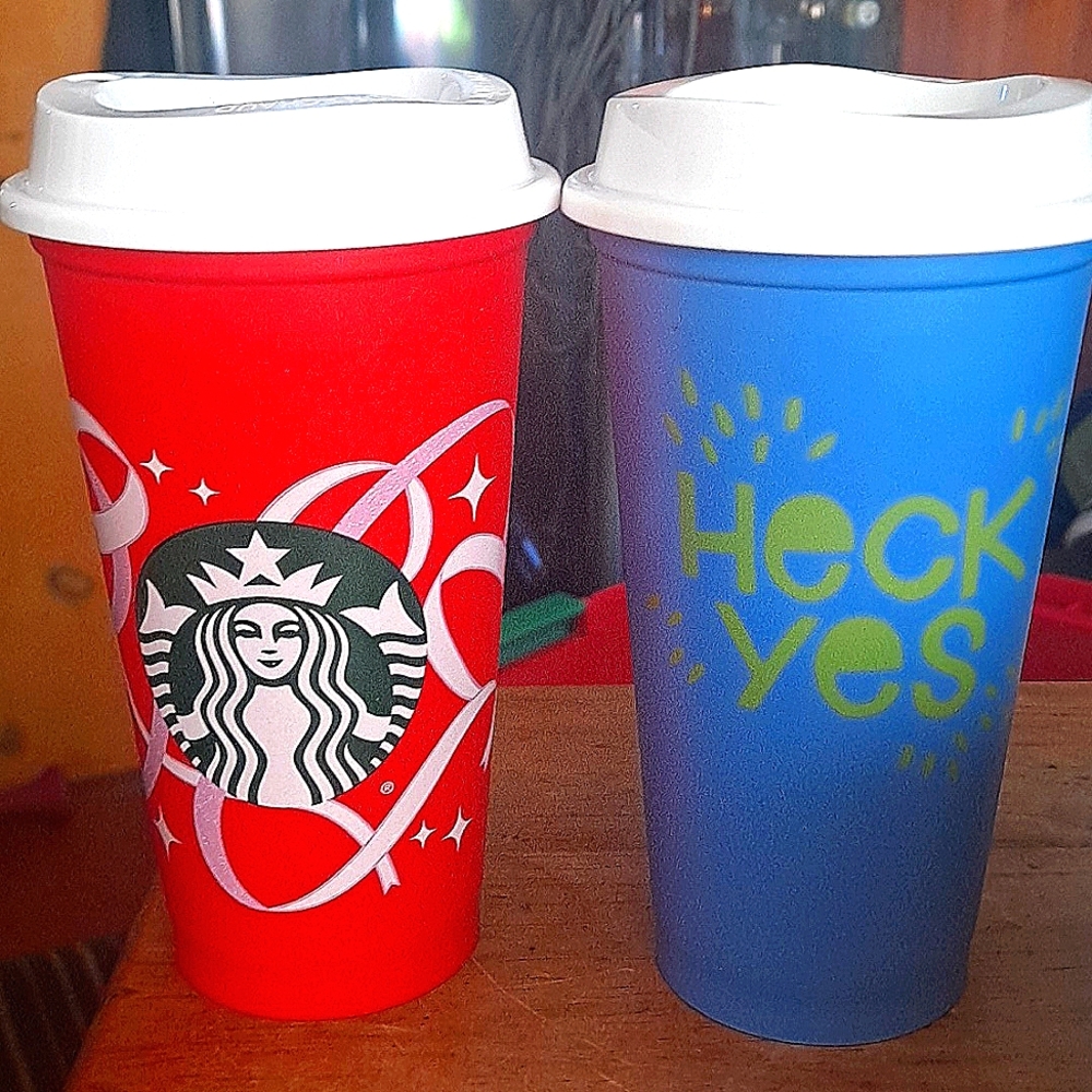 A collection  of Starbucks coffee cups